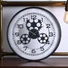 Kép 1/2 - Fogaskerekes falióra 48 cm – steampunk clockwork stílus, fekete fém és fa dizájnnal